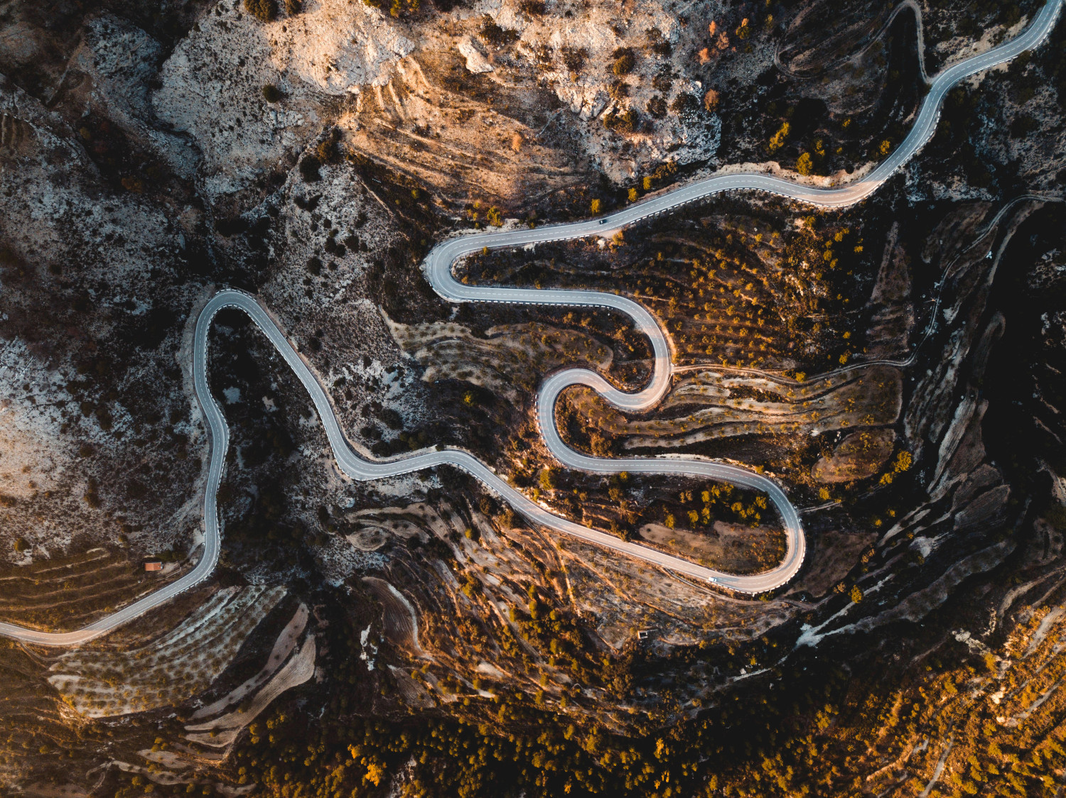 Top-down view of a winding mountain road